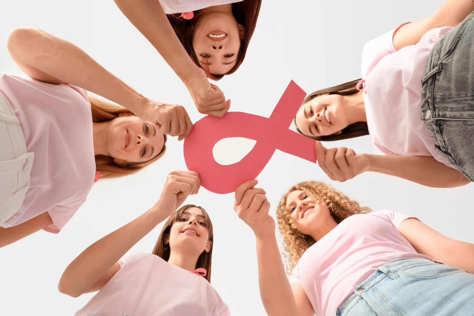 Beautiful Women With Pink Ribbon On Color Background, Bottom View. Breast Cancer Awareness Concept